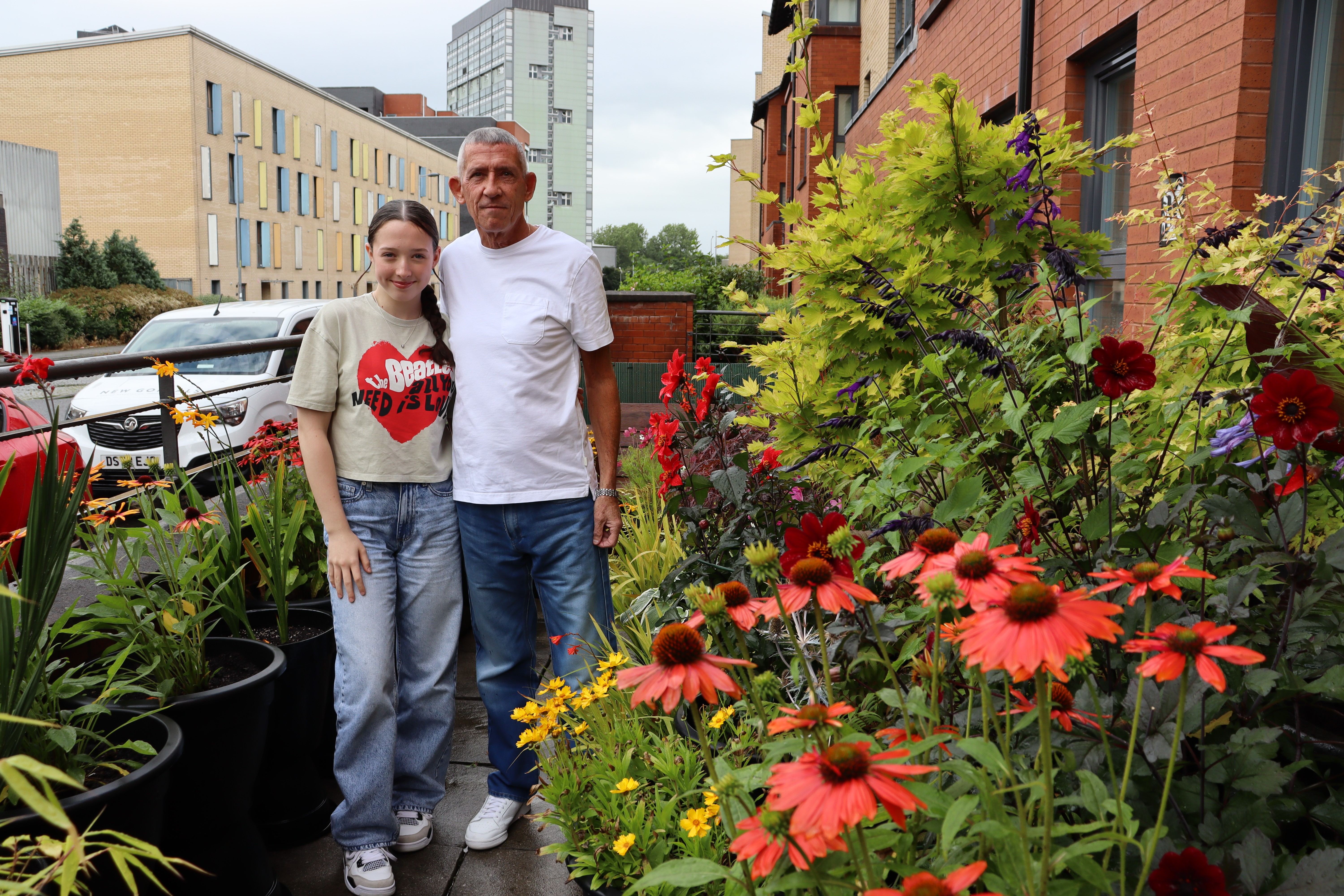 Mr Mulligan and Beth in their Waddel Street garden